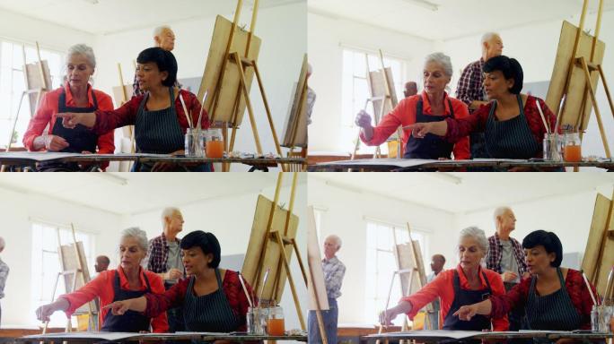 绘画工作室中一群老年人一起画画