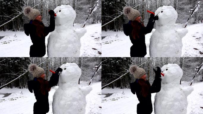 女人用胡萝卜做雪人鼻子
