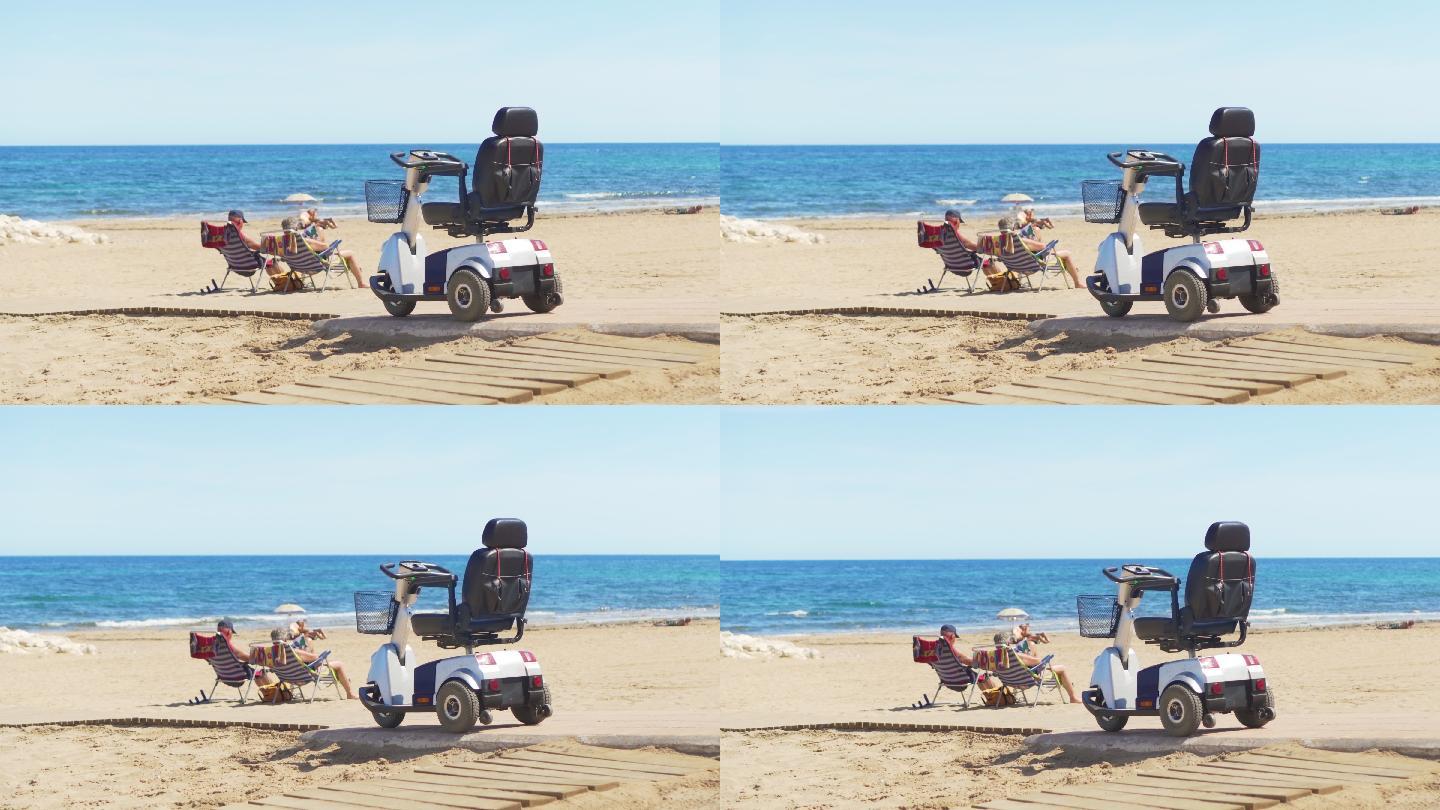 海边沙滩上的电动轮椅