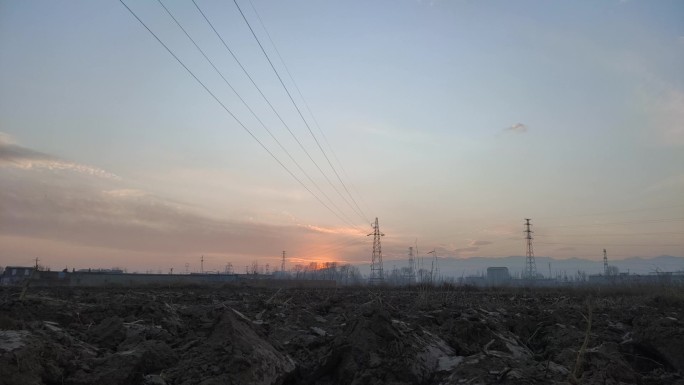 农村 夕阳 延时拍摄 落日 土地 电网