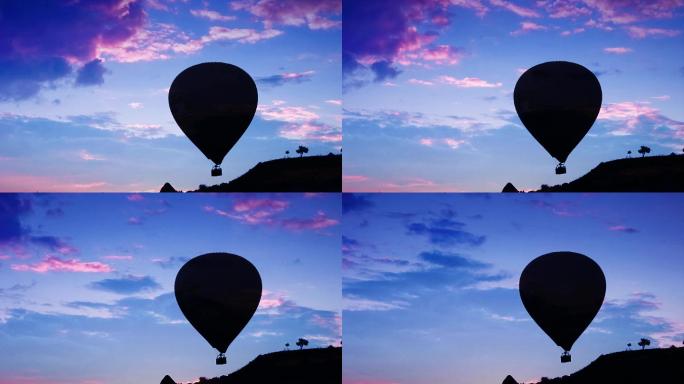 唯美夕阳下的剪影热气球