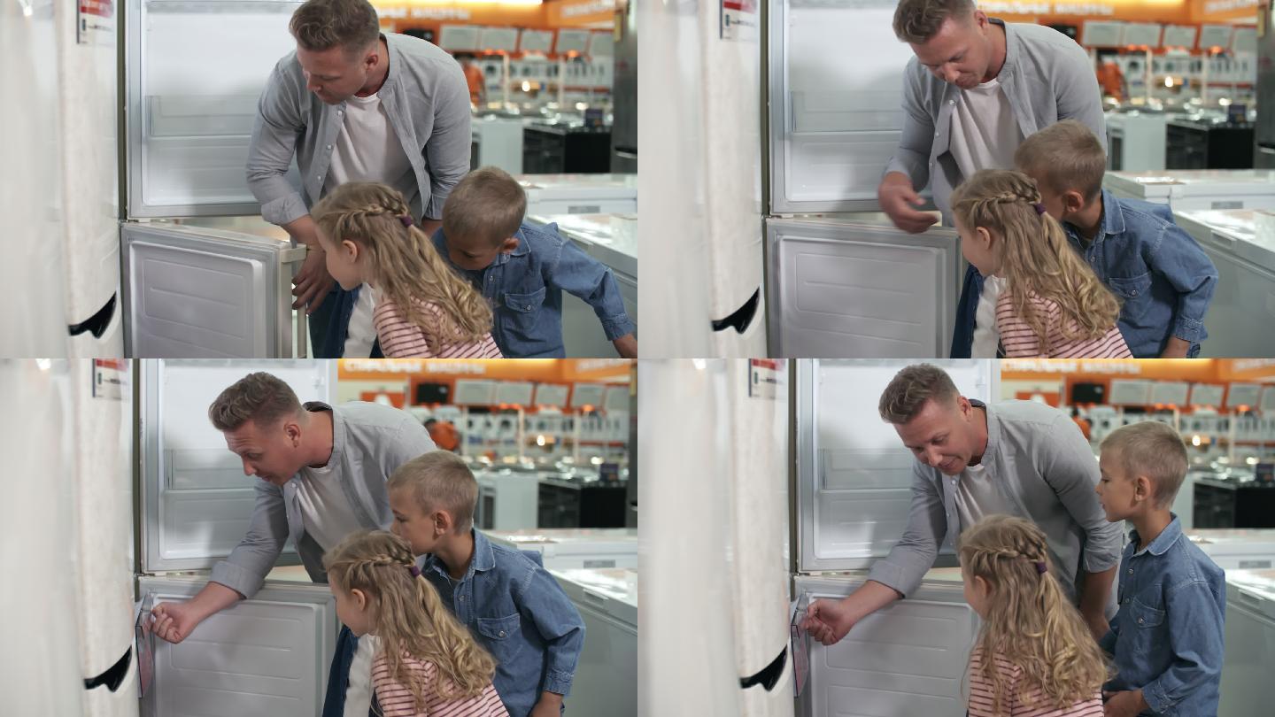 爸爸和孩子们在家电店看冰箱