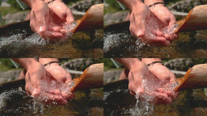 清澈的流水双手接水捧水水资源清泉灵泉