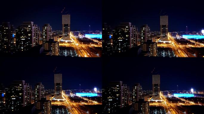 北京夜景俯瞰奥林匹克公园水立方车流延时
