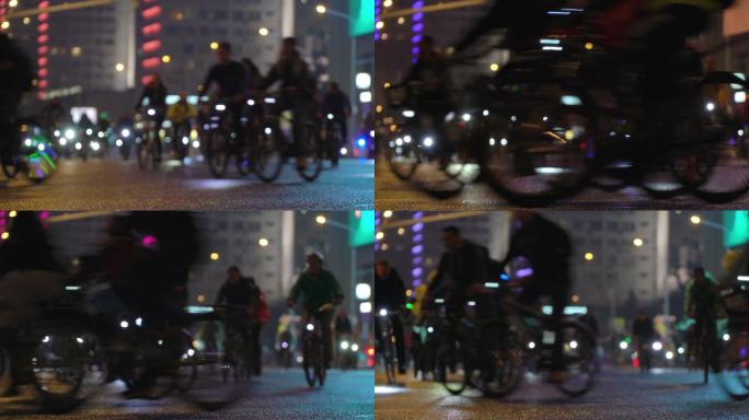 许多骑自行车的人在夜间骑自行车