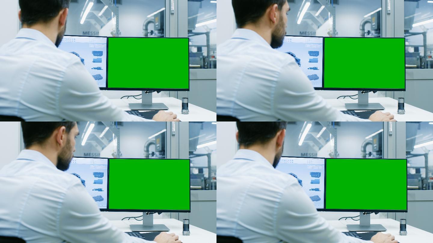 工程师在一台绿色屏幕的个人电脑上工作