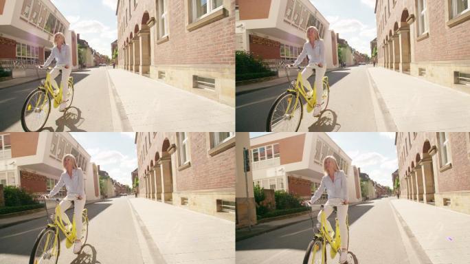 阳光下骑自行车的女人