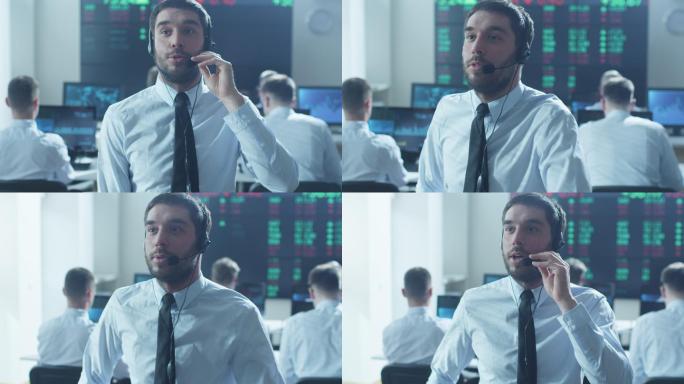 股票经纪人在证券交易所使用耳机交谈