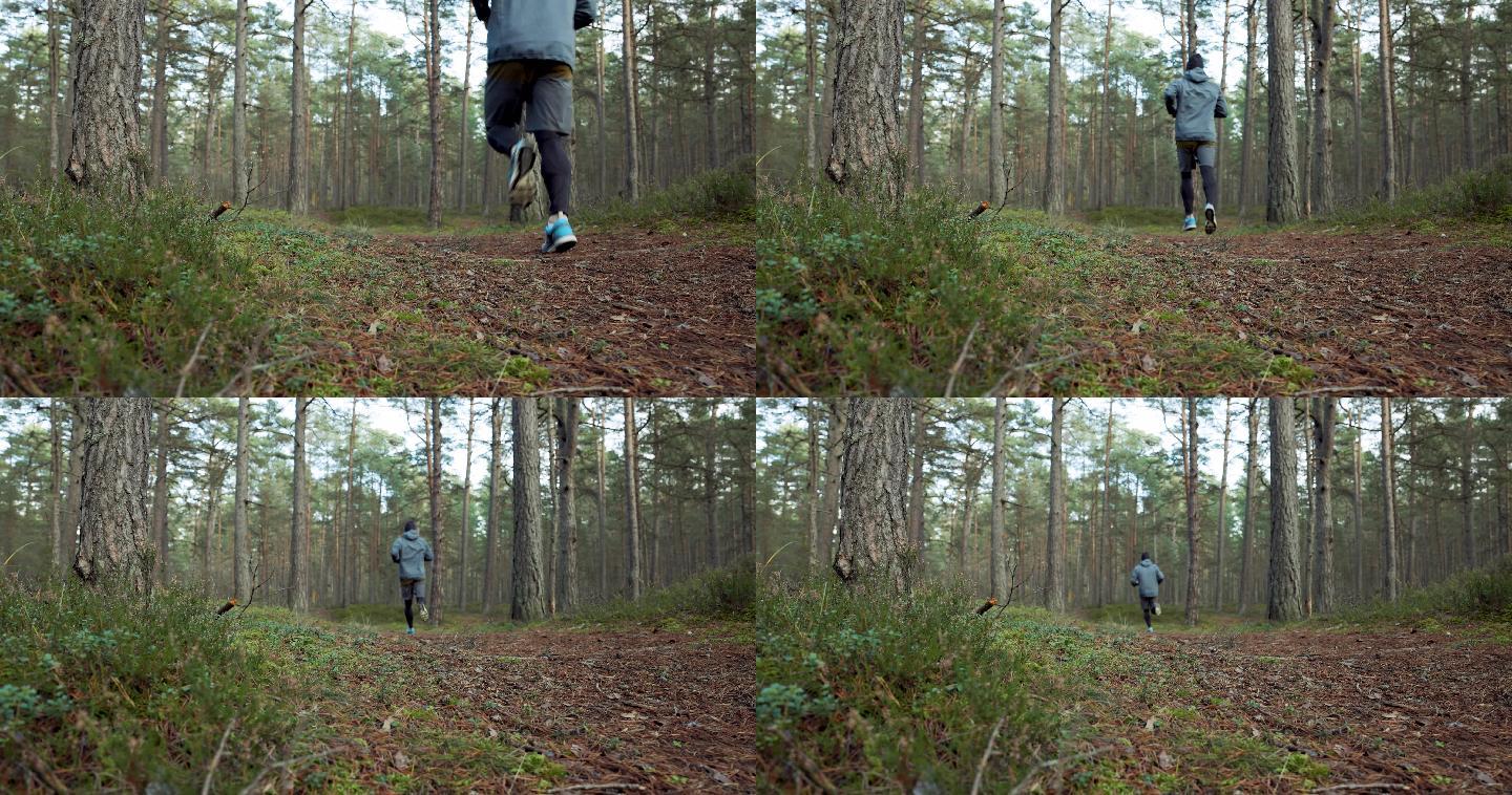 在森林中奔跑的男人