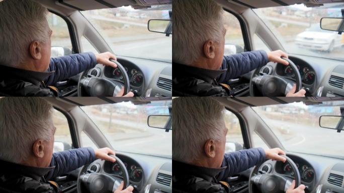 白发老人开车驾车运货司机上路