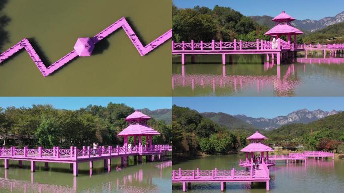 佛冈田野绿世界湖泊中水榭长廊粉红色幸福桥