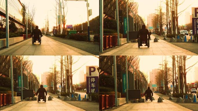 坐轮椅的老人，向夕阳走去