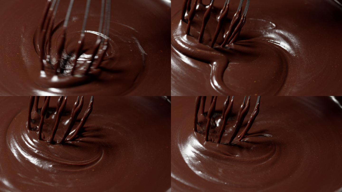 厨师搅拌融化的黑巧克力