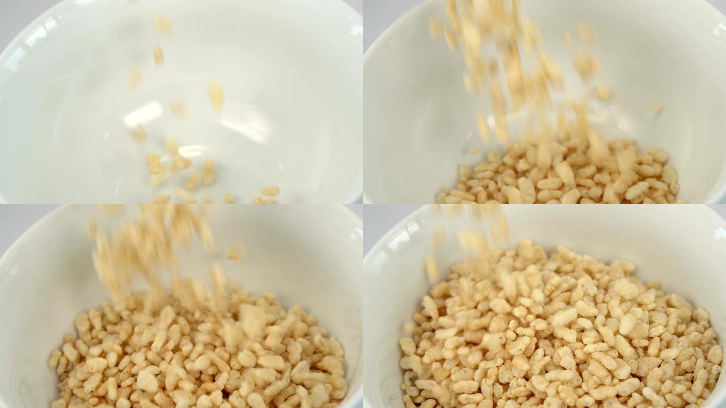 米饭早餐麦片落入白碗