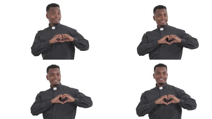 牧师用象征爱情的手指做着心形手势