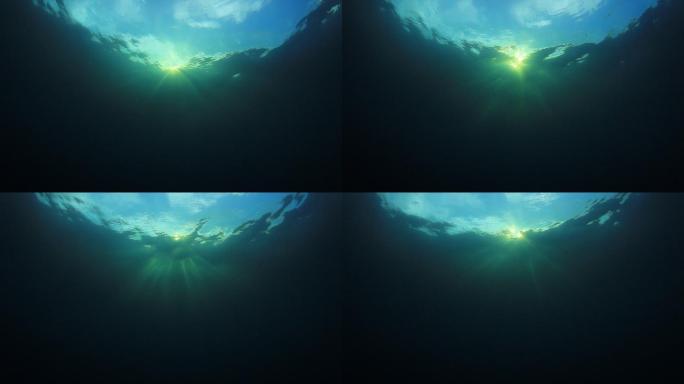 阳光照射在海洋表面的水下视频