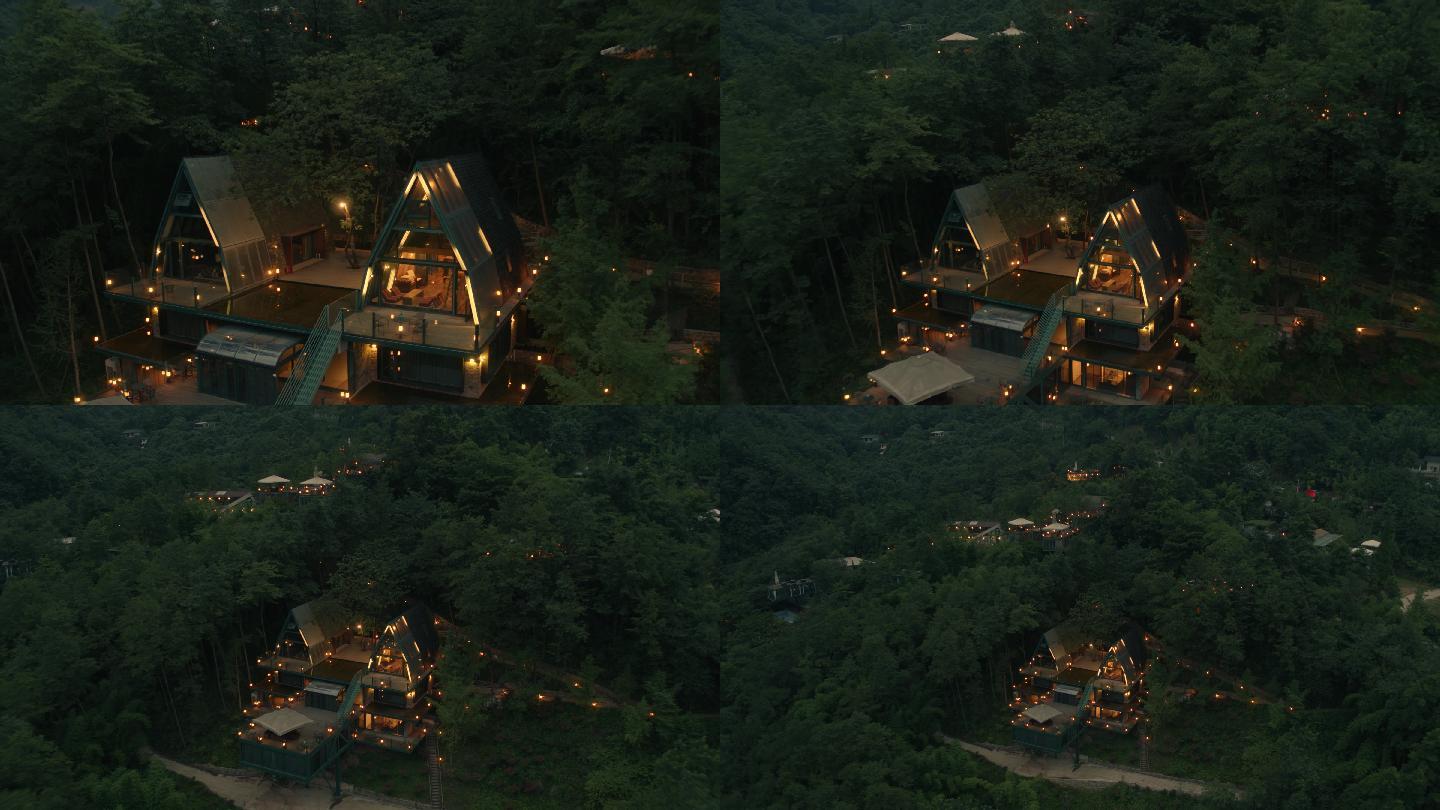 黄昏夜幕下的森林山村度假屋航拍