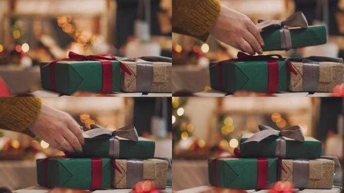 女士手持圣诞或新年装饰礼品盒