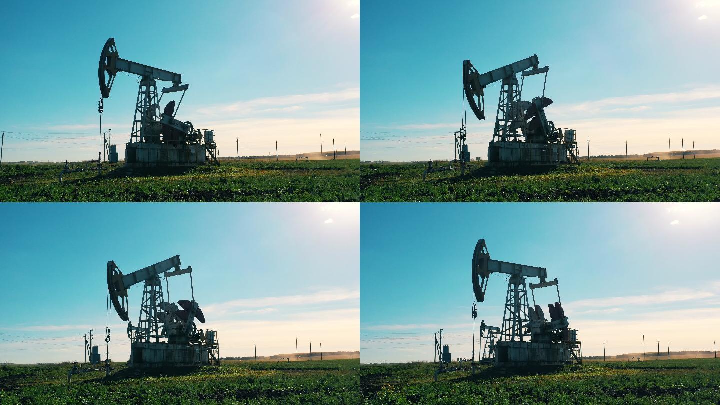白天在田里工作的石油钻机。