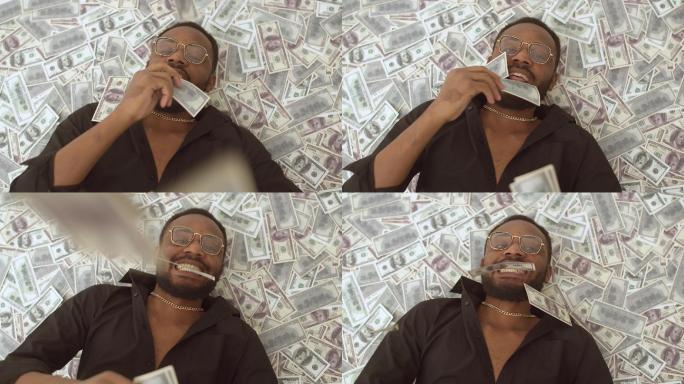 男子躺在一堆钱上咬着钞票