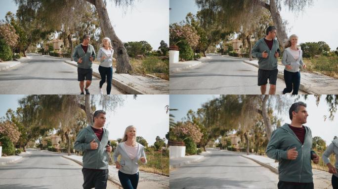 在户外跑步的夫妇运动健身锻炼有氧慢跑欧美