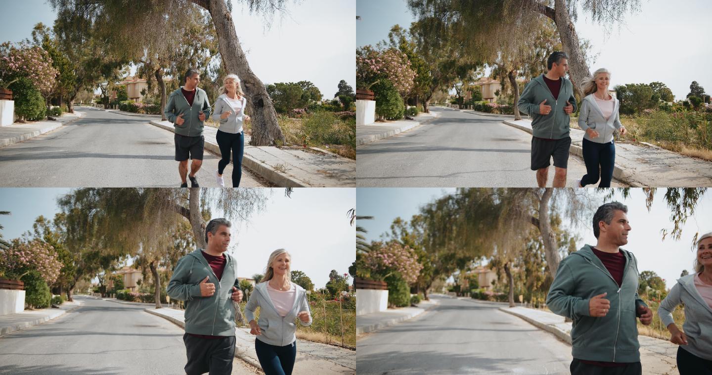 在户外跑步的夫妇运动健身锻炼有氧慢跑欧美
