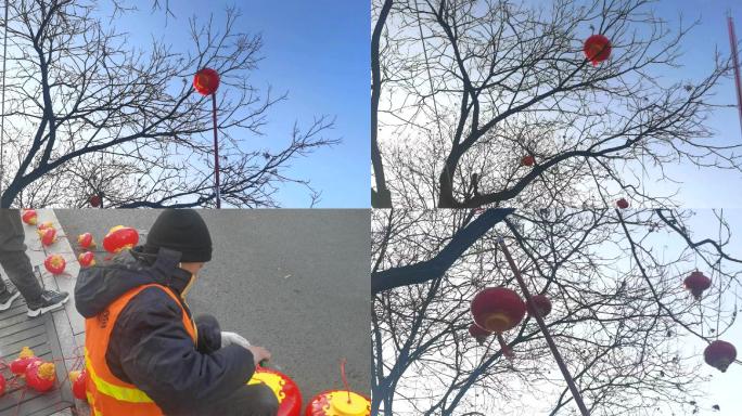 新华大街节日挂灯笼工作人员