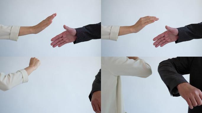 两个人肘部碰撞代替握手。