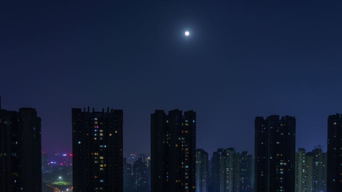 4k城市夜景月亮升起