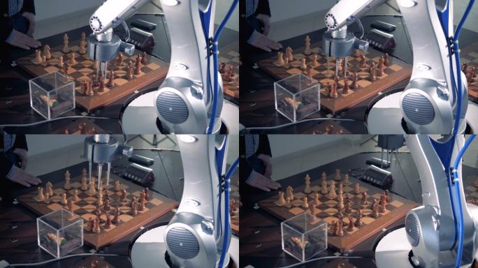机器人手臂移动棋盘上的棋子。