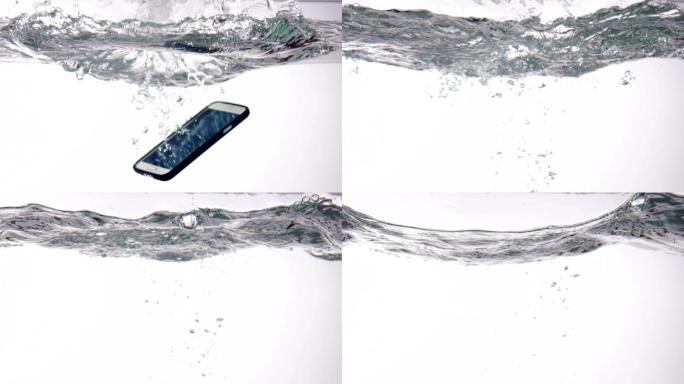 显示来电的智能手机掉入水中，溅起白色水花