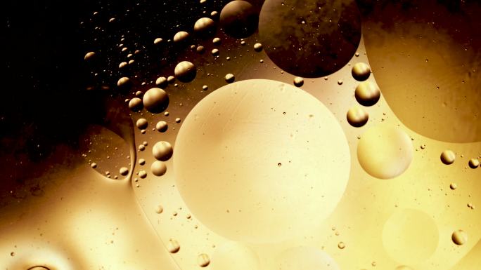 金色和黑色气泡光影视频液体溶液泡泡水泡