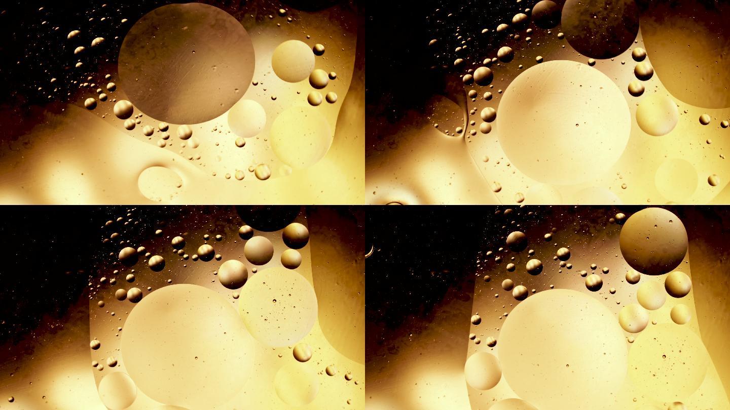 金色和黑色气泡光影视频液体溶液泡泡水泡