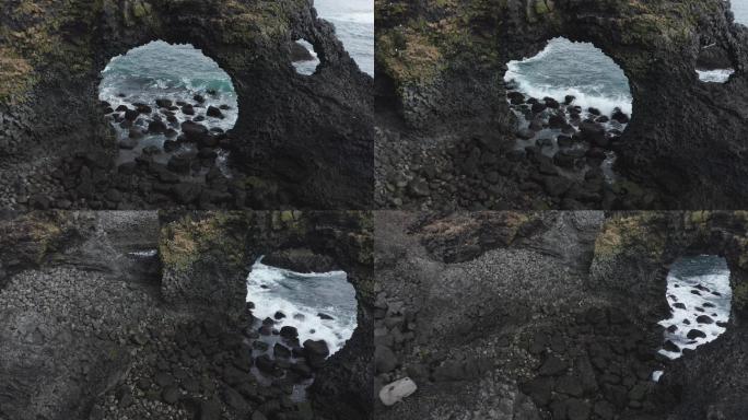 冰岛西部悬崖上的玄武岩柱。
