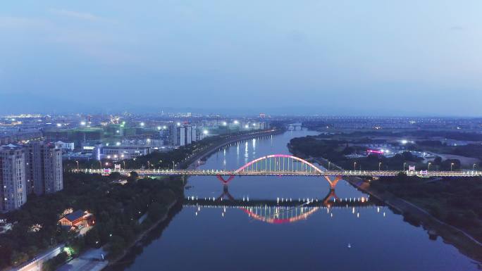 航拍夜晚衢江大桥和现代城市风光