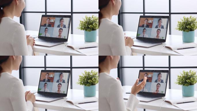 女商人与同事进行虚拟视频会议