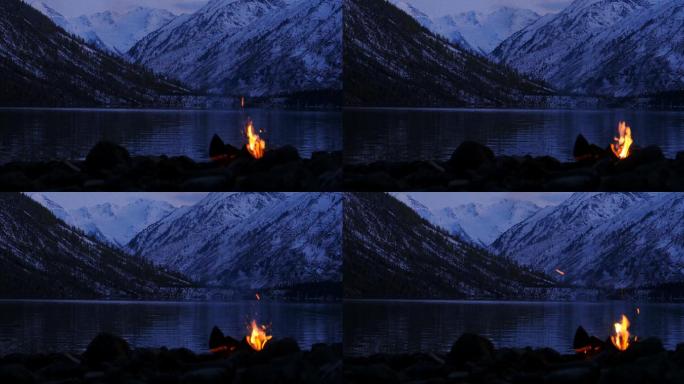 湖边的篝火露营野餐野炊露宿雪山取暖烤火