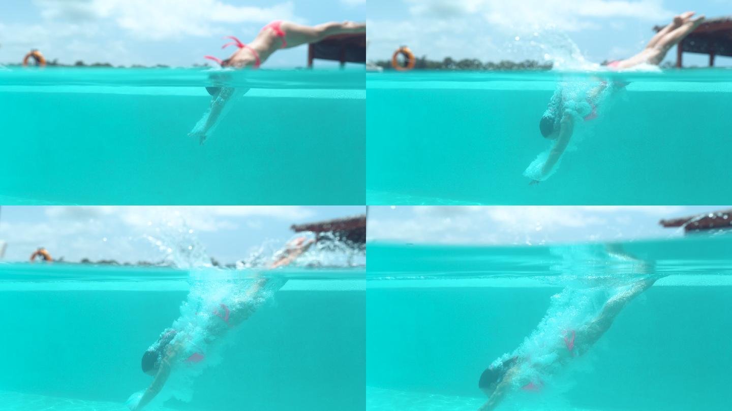活跃的年轻女子跳入水中