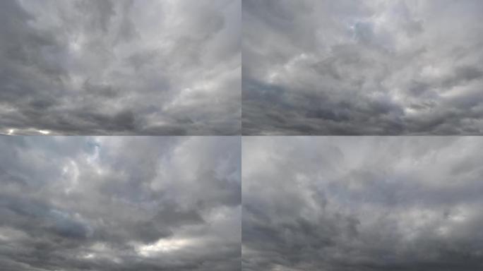 天空飘着蓬松的灰色的云