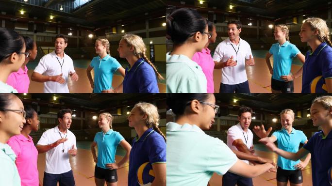 排球教练与女运动员互动