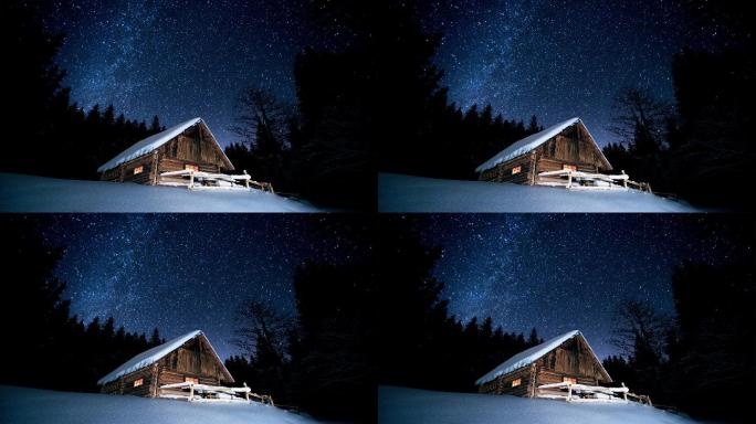 木屋在冬日的森林里，空中闪烁着星星。