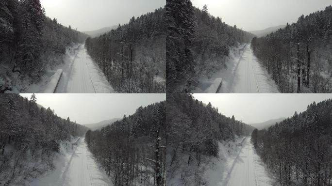 航拍冬季雪地公路