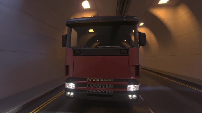 半挂车卡车在空旷的照明隧道内行驶