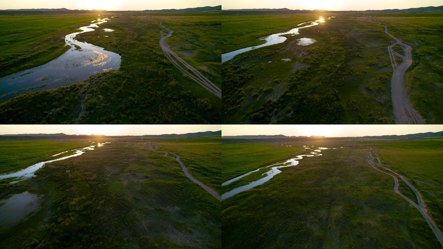 5.4k逆光航拍夕阳下的草原及河流