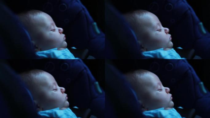 可爱的婴儿睡在汽车座椅上