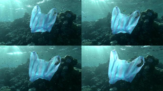 废弃的塑料袋在阳光下慢慢地漂浮在水面下