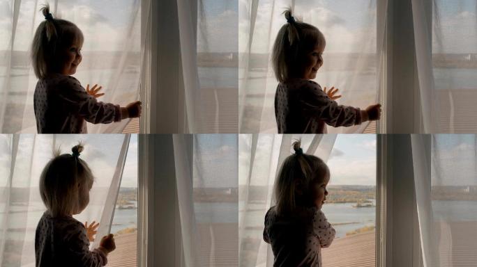 站在窗口的小女孩小孩子国外女儿外国孙女