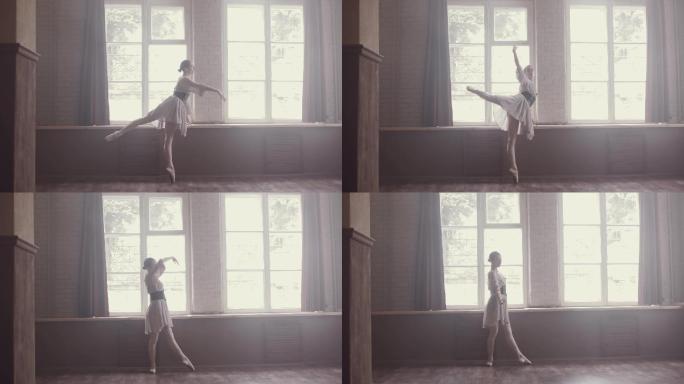 芭蕾舞女演员在训练室进行热身。