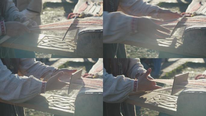 老妇人针线活和编织的特写镜头。