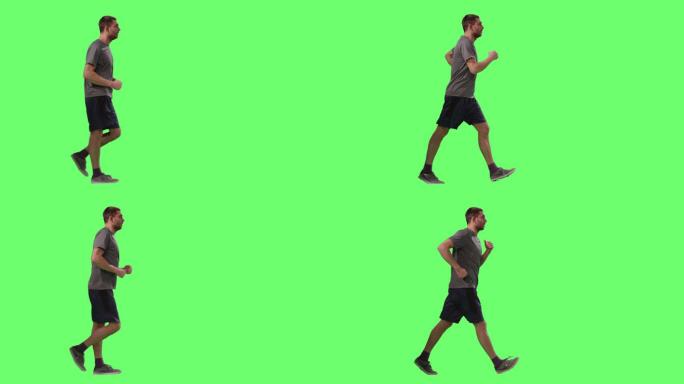 身穿T恤衫的男子在模拟绿色屏幕上运动行走。
